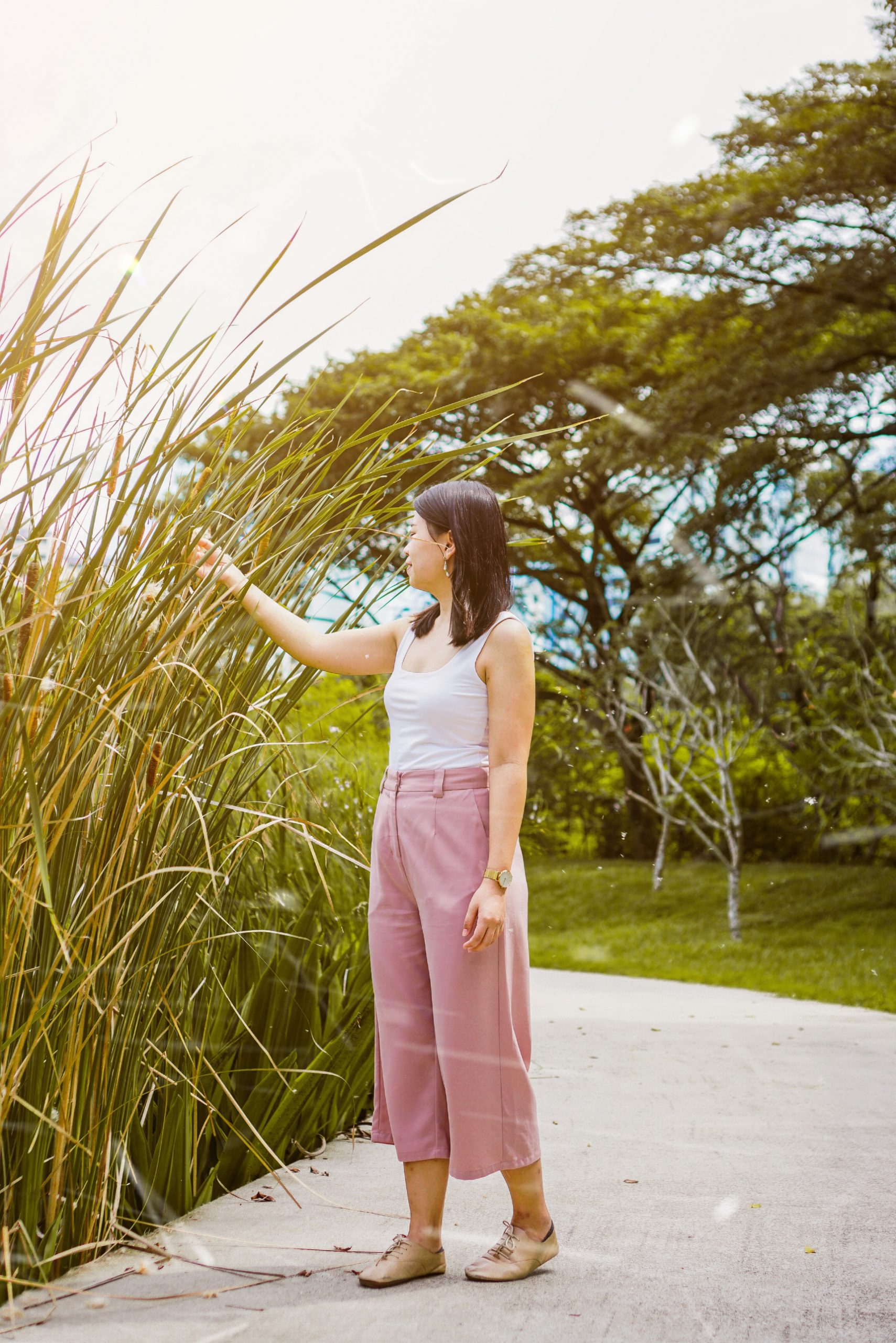 Eunice admiring flora and fauna at Jurong lake