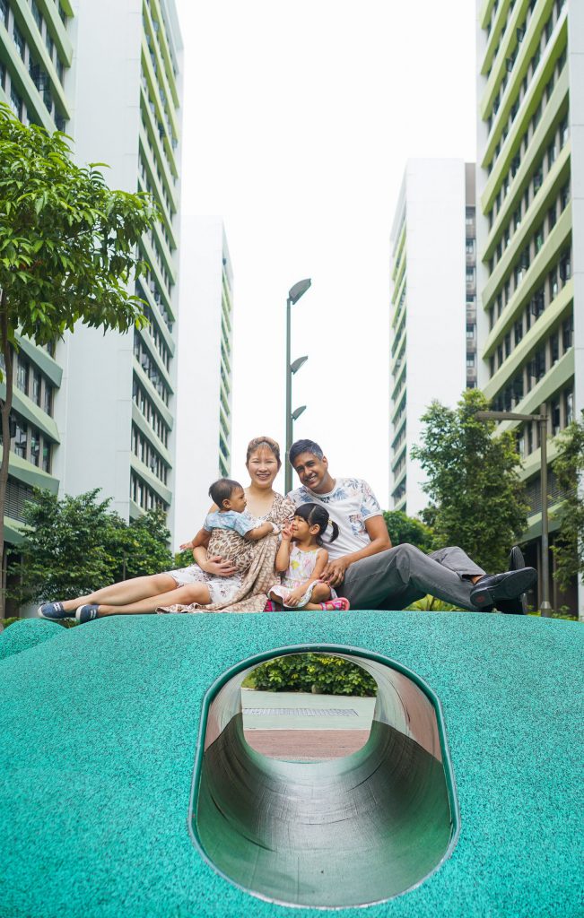 Sarah and her family at the playground at Tampines GreenRidges