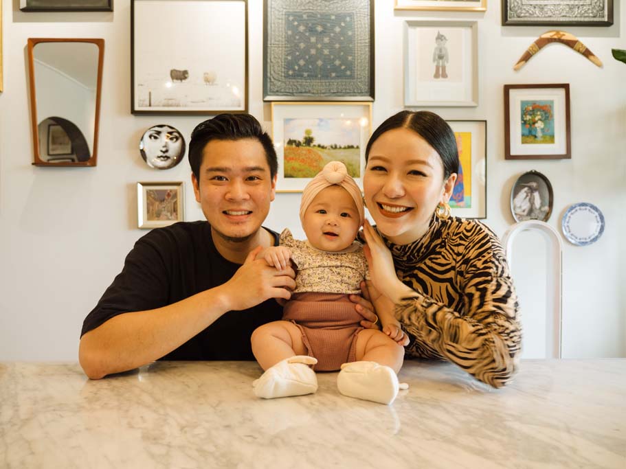 Kenneth and Xin Rong with their daughter