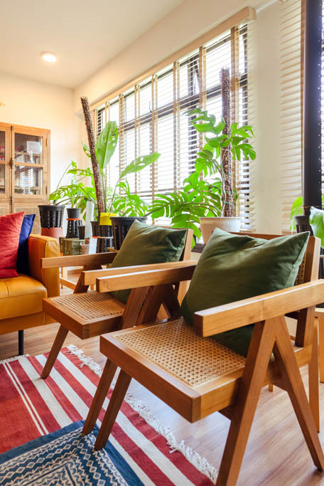 Chairs in the living room of Japanese inspired woody home at Tampines