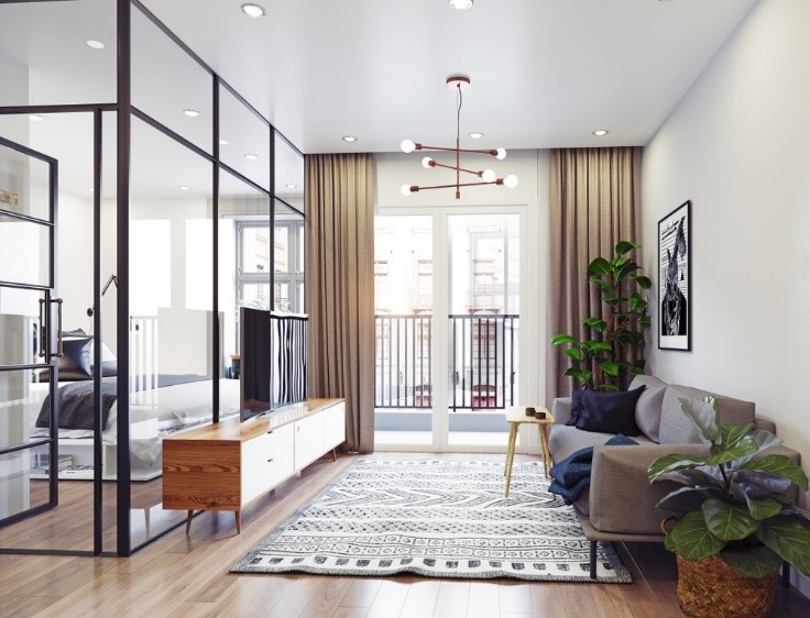 Photo of living room with glass panels leading to bedroom