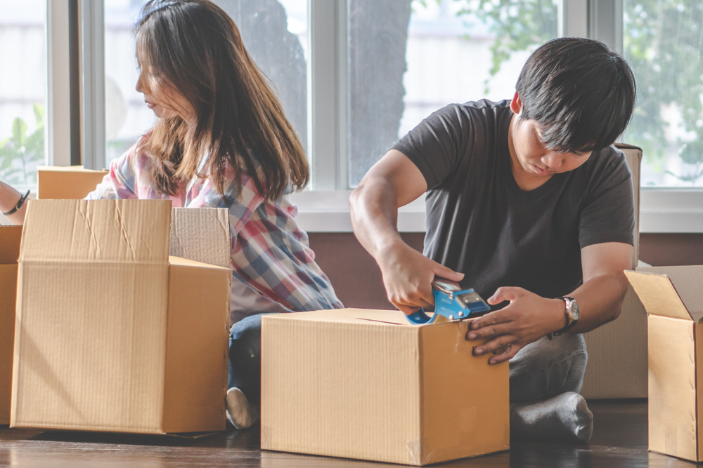 Couple with packing boxes