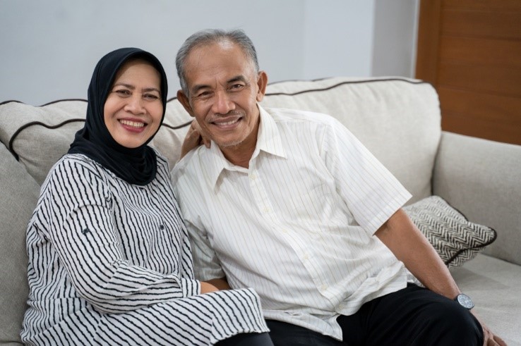 Smiling Malay elderly couple