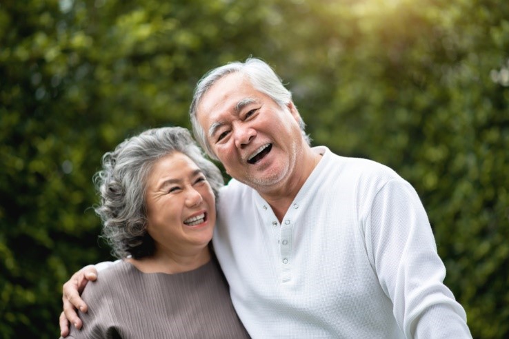Happy elderly couple smiling